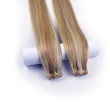 Load image into Gallery viewer, Real Human Hair Blonde High light Two Tone #27/613 Tape in Hair Extensions شعر بشري حقيقي أشقر عالي الخفة بلونين # 27/613 شريط في وصلات الشعر